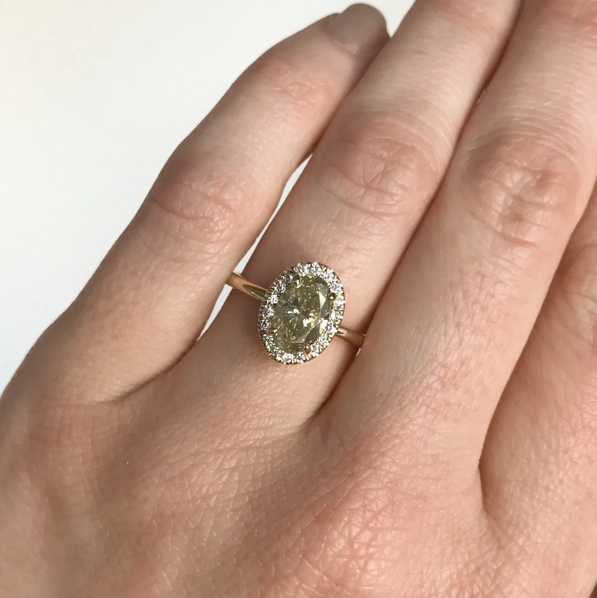 1.12ct Green-Grey Oval Diamond in 14k Yellow Gold Halo Setting