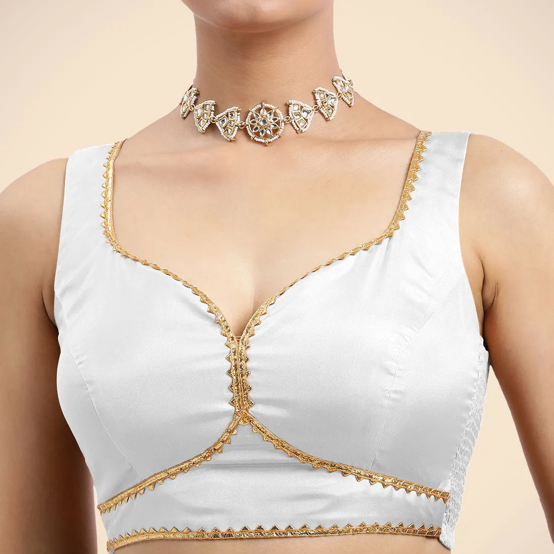 Ishika x Tyohaar | Pearl White Sleeveless FlexiFit™ Saree Blouse with Beetle Leaf Neckline with Golden Gota Lace and Back Cut-out with Tie-Up