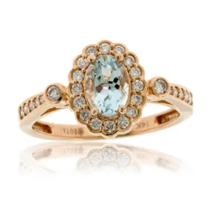 Oval Aquamarine and Diamond Scalloped Halo Ring