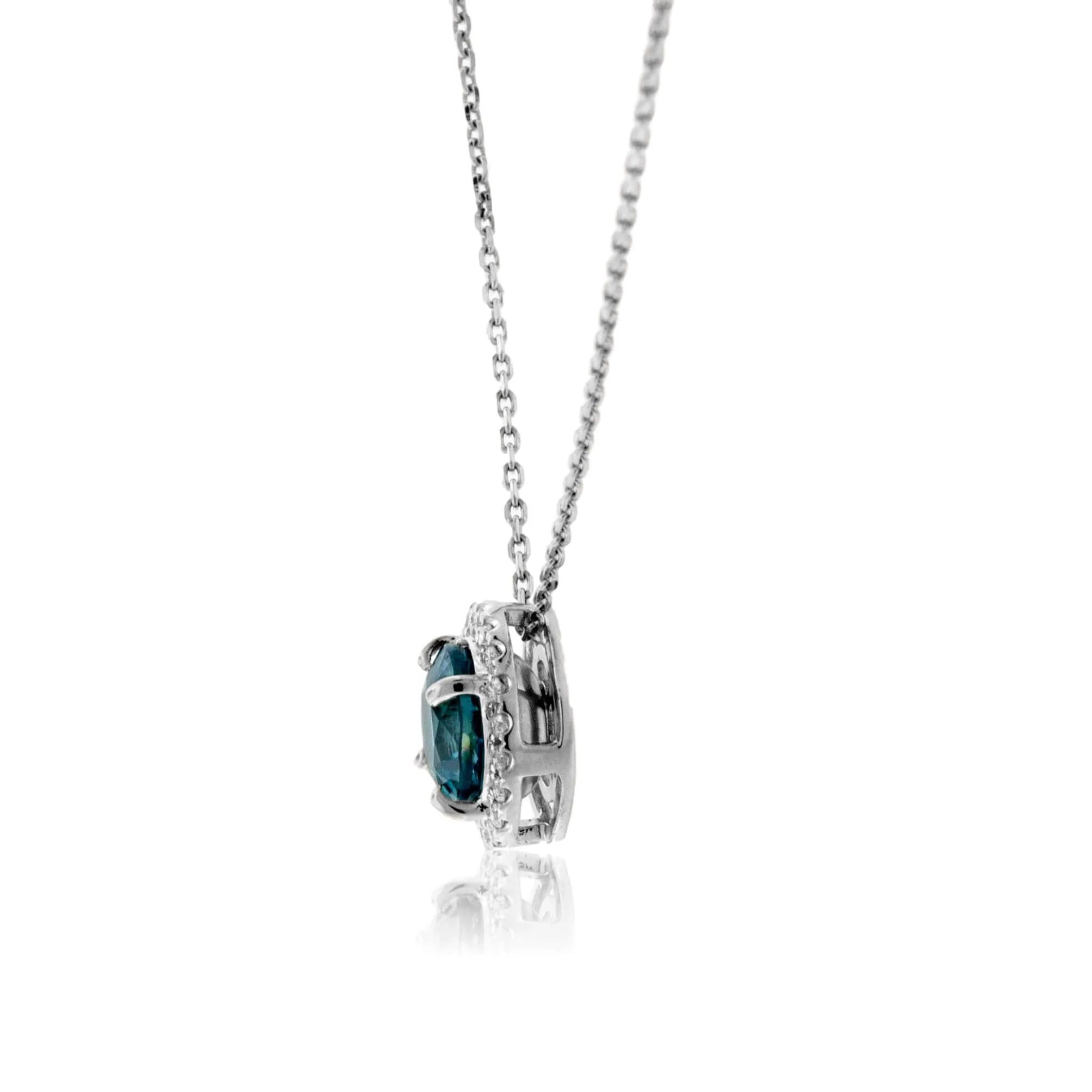 Stunningly Simple Blue Zircon in Diamond Halo Pendant