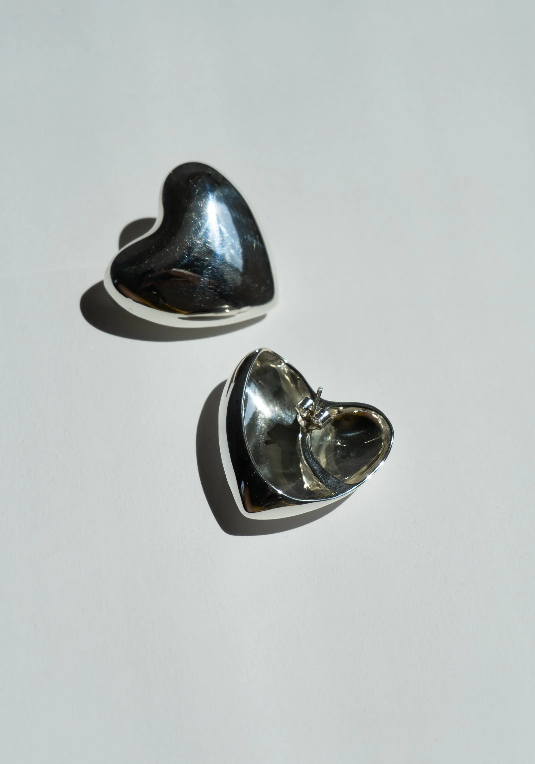 Voluptuous Heart Earrings in Silver