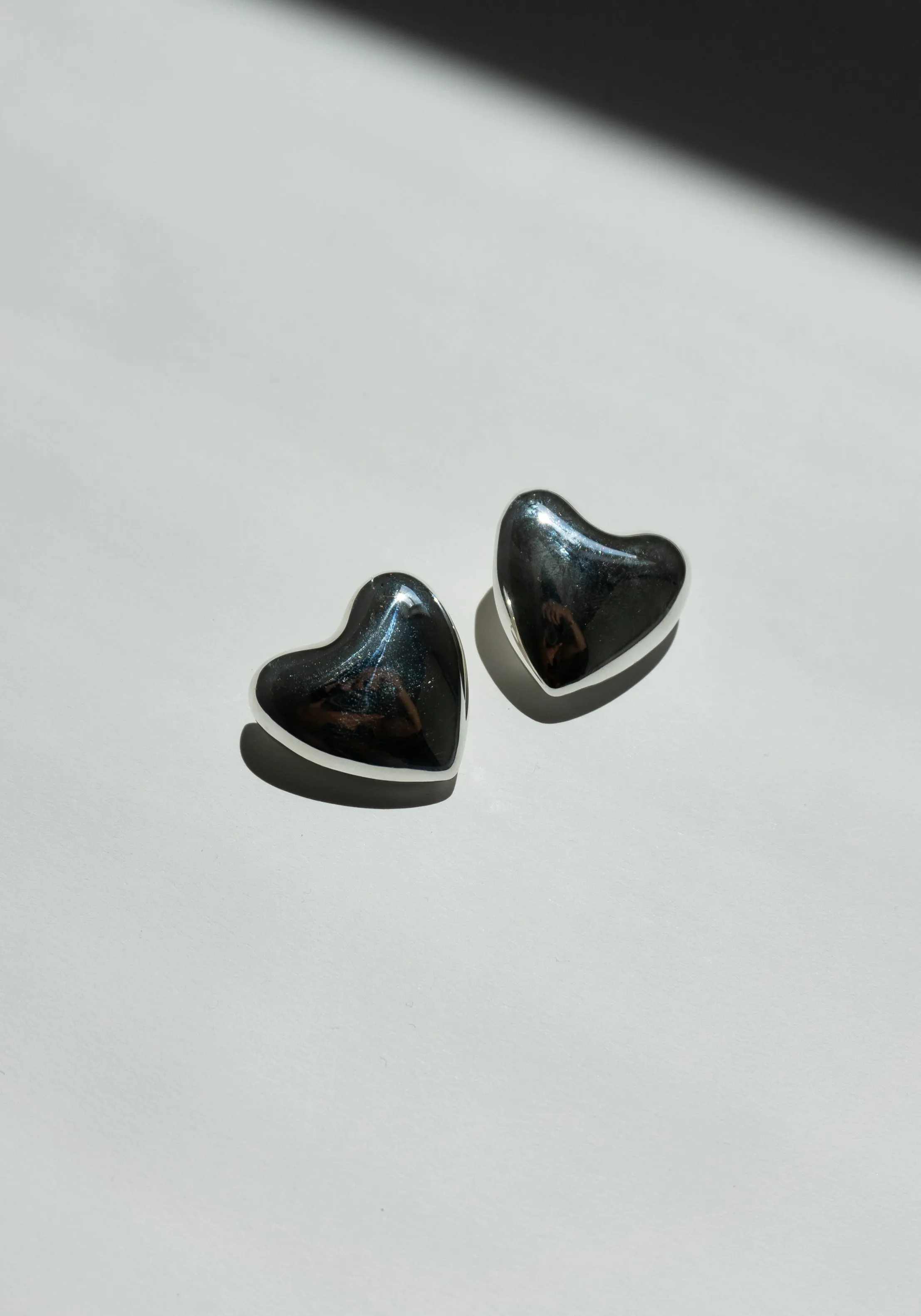 Voluptuous Heart Earrings in Silver