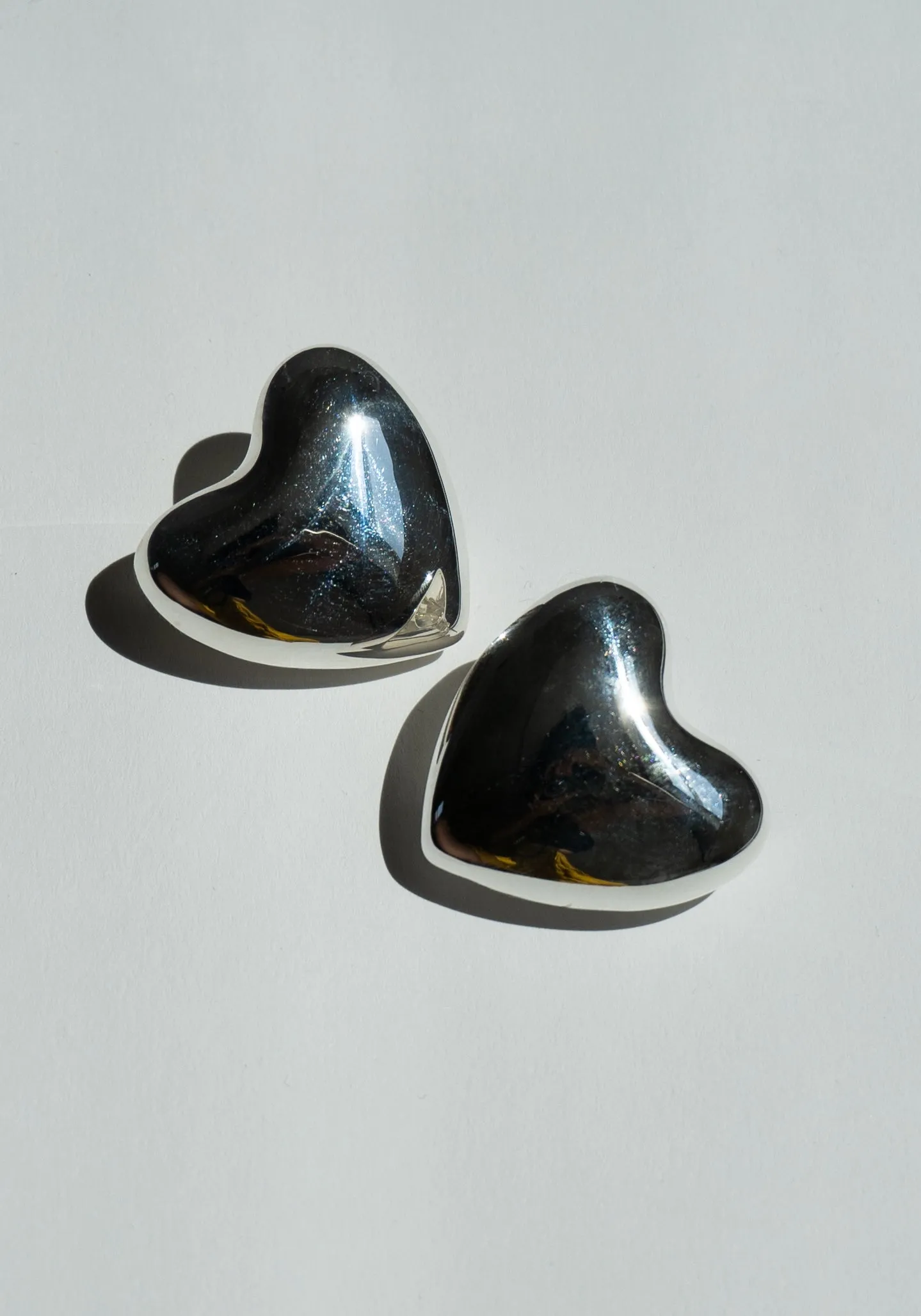 Voluptuous Heart Earrings in Silver